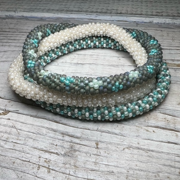 👀🆕 Set of three awesome roll on bracelets. Perfect to add a pop of color! ❤️ - Picture 5 of 8